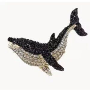 Elegant Black and Silver Whale Brooch